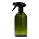Green spray bottle with black nozzle on a white background