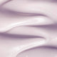 Swatch of thick & creamy plant stem cell retinol alternative moisturizer. Purple tint. 