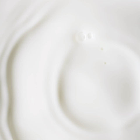 Swatch of Plant Stem Cell Retinol Alternative Serum - milky white thin texture.