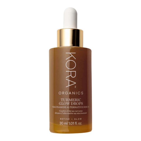 30ml bottle of Kora Organics Turmeric Glow Drops serum on a white background.