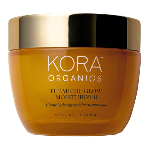 Kora Organics Turmeric Glow Moisturizer 50ml jar with gold lid on a white background.