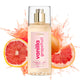Lavanila Vanilla Grapefruit 150ml perfume mist bottle with grapefruit slices on a white background.