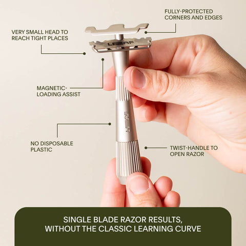 Hand holding a single blade razor with features highlighted on a beige background