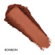 Brown makeup swatch labeled 'BONBON' on a white background