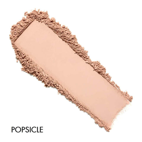 Makeup swatch of the shade 'POPSICLE' on a white background