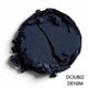 Navy blue makeup shade with textured edges on a white background, labeled 'Double Denim'.
