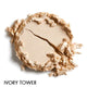 Crumbled makeup swatch in the shade 'Ivory Tower' - a creamy nude on a white background.