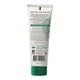 The back of a white squeeze tube of baby sunscreen, featuring green accents, a green cap, and extensive black text detailing ingredients and certifications.
