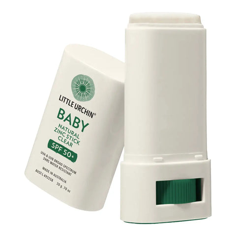 Little Urchin Baby Natural Zinc Stick Clear SPF 50+ sunscreen stick shown with the cap removed and standing beside the container on a white background.