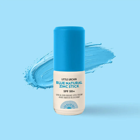 A sunscreen stick from Little Urchin, labelled 'Blue Natural Zinc Stick SPF 50+', set against a light blue background with a matching blue cream paint stroke behind it.