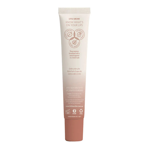 Back of tube of Little Urchin Lip Balm in the shade Brown Sugar, showing icons and text.