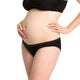 Person wearing black underwear on a white background
