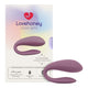 Purple wearable couple's massager with Lovehoney packaging on a white background. 