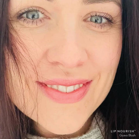 Woman wearing Luk Beautifood Bon Bon Blush Lip Nourish Guava Blush 3g. 