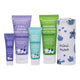 A set of MooGoo baby care products, including a 2-in-1 gentle bubbly wash, soothing moisturiser tube, nappy change cream tube, and white roll-up towel with blue cartoon prints.
