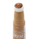 A close-up of the fluffy applicator with some bronze drops squeezed onto it. Copper tone with glittery shimmer.