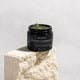 MUKTI Gentle Melt Cleansing Balm with lid off showing jelly-like texture.
