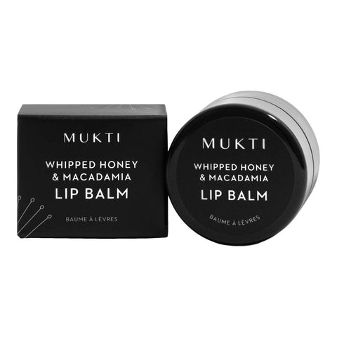 Mukti Whipped Honey & Macadamia Lip Balm with packaging on a white background