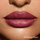 Close-up of lips wearing a deep plum lipstick with '07 Deep Plum' text.