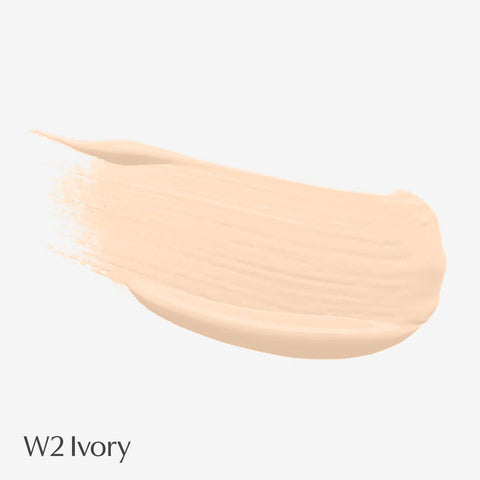 Foundation swatch labelled W2 Ivory on a light grey background.