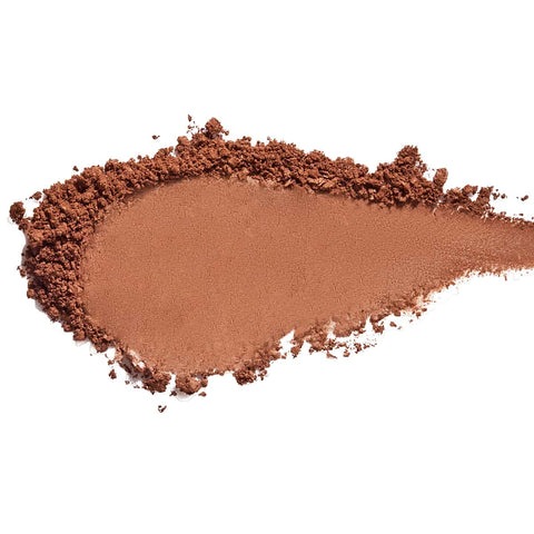 Swatch of Nude By Nature Pressed Matte Mineral Bronzer 10g 01 Bondi Bronze shade on a white background.
