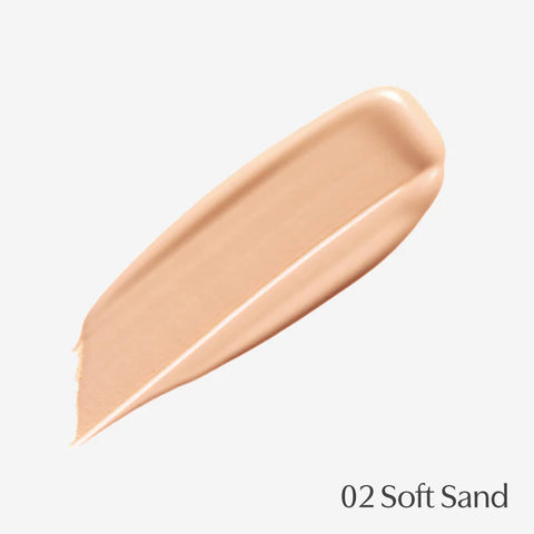 BB cream swatch labelled '02 Soft Sand' on a light beige background.
