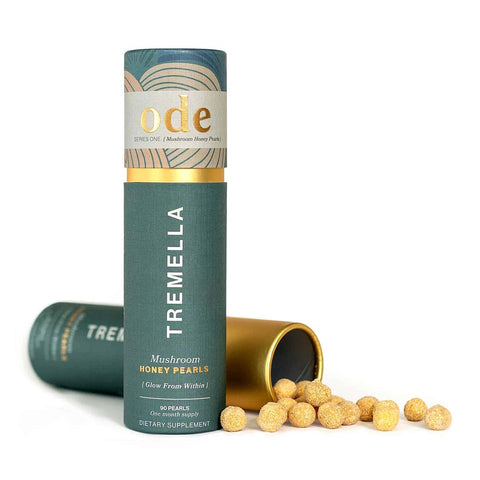 Tremella mushroom honey pearls packaging with open lid on a white background.