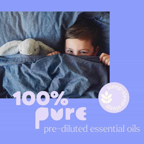 Child peeking from under a blanket with a stuffed animal, surrounded by text about 100% pure pre-diluted essential oils.
