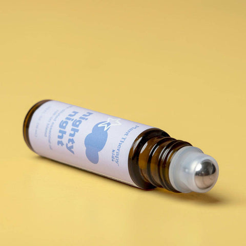 Roll-on bottle with a label on a yellow background