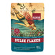 A stand-up pouch of Power Super Foods Dulse Flakes, featuring a vintage-style illustration of a woman swimming underwater with red seaweed. The packaging is teal and red with a beige top section.