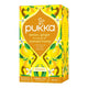 Pukka lemon, ginger, and manuka honey tea box on a white background