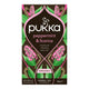 Pukka peppermint & licorice herbal tea packaging on a white background.