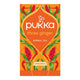 Pukka three ginger herbal tea orange package on a white background. 