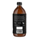 Brown bottle with black label on a white background,