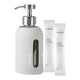 Grey soap dispenser with two tubes of resparkle natural foaming hand wash on a white background