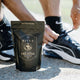 Ritua creatine supplement package with a person tying their running shoes in the background.