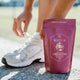 Ritua Creatine supplement package with a person wearing running shoes outdoors.