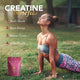 Woman in workout attire outdoors with creatine benefits text and product packaging.