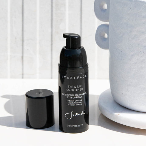 Eye & lip smoother pump bottle styled with white minimalist elements.