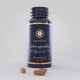 Superfeast Ashwagandha supplement bottle with capsules on a grey background.