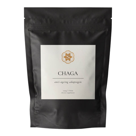 Black package of Chaga supplement with a white label on a white background