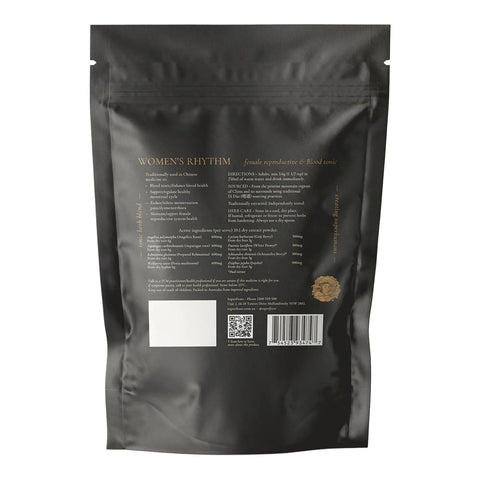 The back of a matte black resealable stand-up pouch for Women's Rhythm, showing product details, ingredients, a barcode, and a small gold seal on a white background.