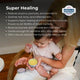 Woman holding a baby and a jar of cream with text about the product's benefits.