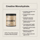 Creatine Monohydrate supplement container with benefits listed on a beige background.