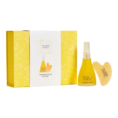 'The Jojoba Company' gift set with skincare bottle and Gua Sha tool.