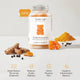 Teddi Lab Turmeric Extract Gummy supplement with turmeric root, gummy bears, and black pepper on a light gray background.