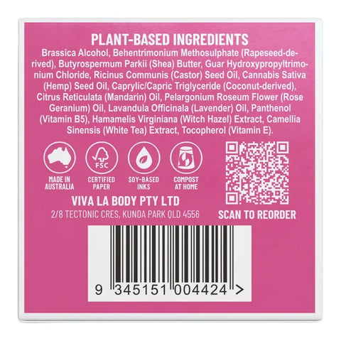 The back of a product box showing a pink panel with ingredient list text, certification icons, a QR code, and a barcode.