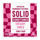 Front packaging of Australian Handmade Natural Solid Conditioner in Creamy Curls for curly hair, featuring a white center with magenta and pink checkered side panels.