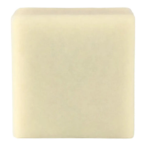 A square, pale cream-coloured solid soap bar shown against a plain white background.