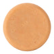 A round, orange-colored soap bar with a textured, porous surface.